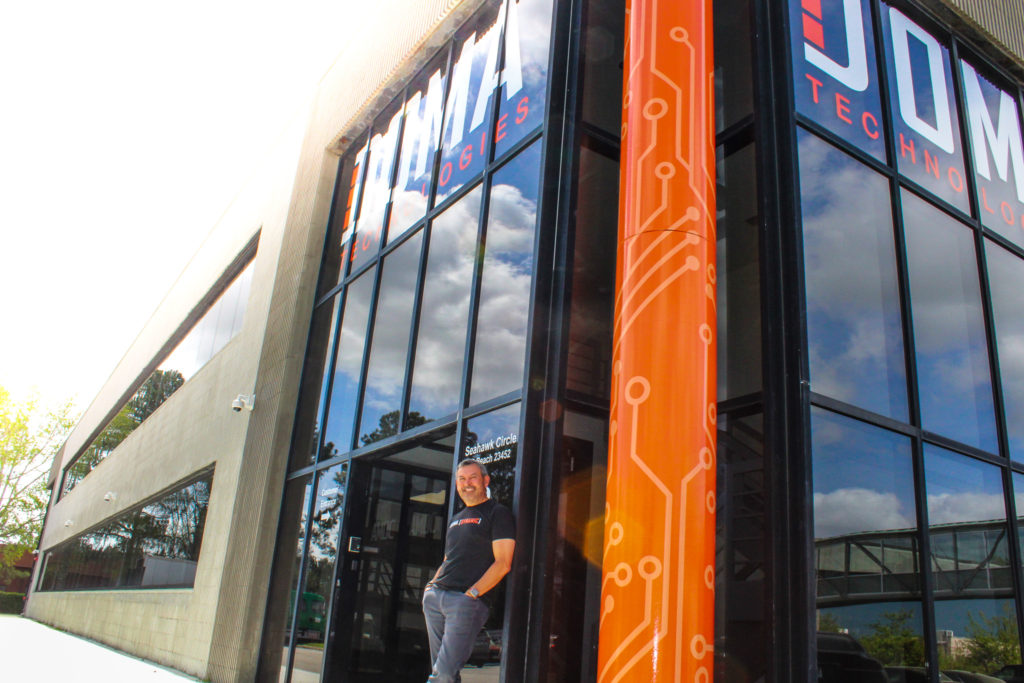 DOMA's President & CEO Pat Feliciano Standing Outside DOMA's New Upgraded Building